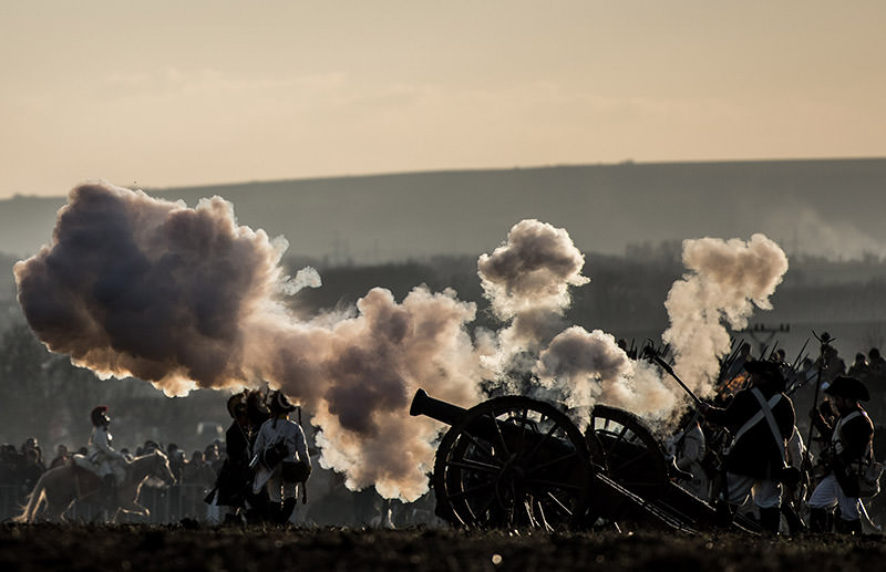 History enthusiasts dressed in regimental costumes fire a cannon, celebrating its 211th anniversary of the battle of Austerlitz on Dec. 3, 2016. (AA Photo)