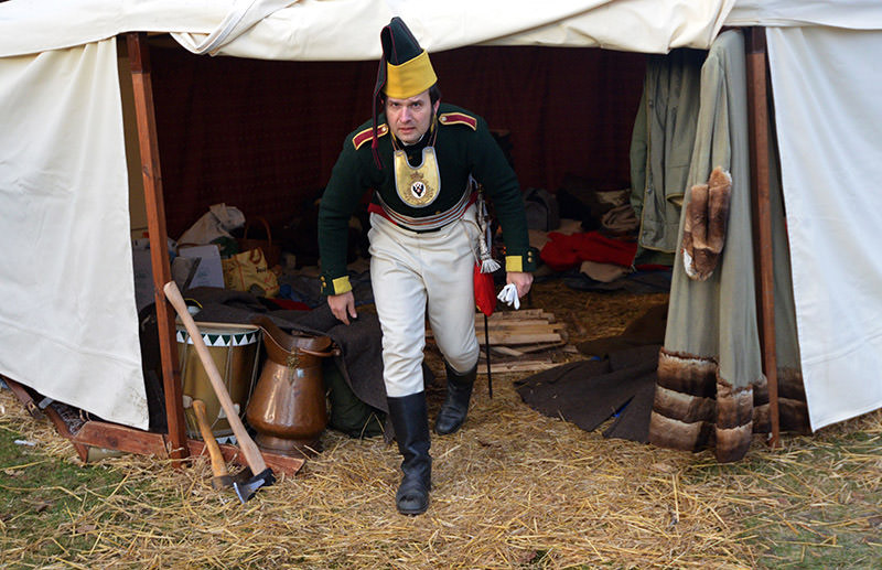 Historical re-enactment enthusiast dressed as a soldier leaves his tent on December 03, 2016 in Tvarozna prior a re-enactment of Napoleon's famous battle of Austerlitz. (AFP Photo)