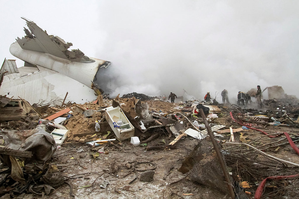 Rescue teams are seen are seen at the crash site of a Turkish cargo jet near Kyrgyzstan's Manas airport outside Bishkek, January 16, 2017. (Reuters Photo)