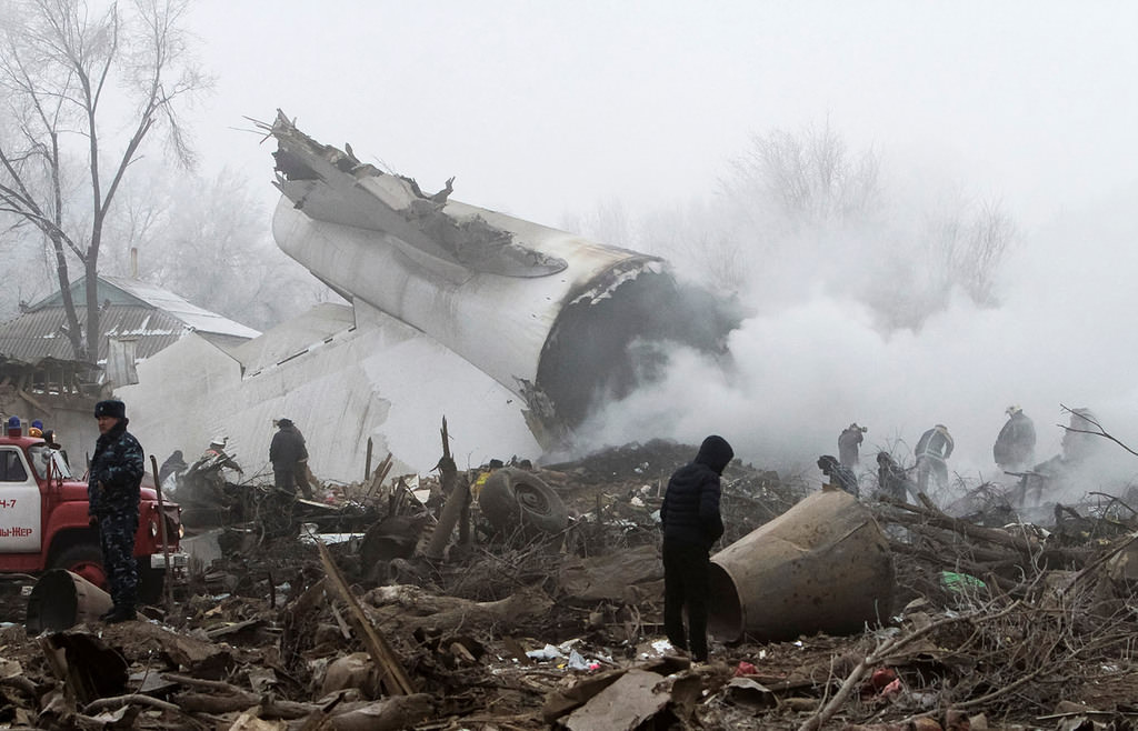 Rescue teams are seen at the crash site of a Turkish cargo jet near Kyrgyzstan's Manas airport outside Bishkek, January 16, 2017. (Reuters Photo)