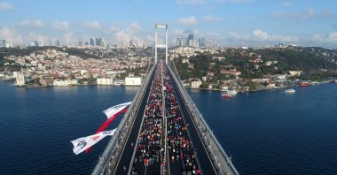 Runners cross the July 15 Martyrs' Bridge, formerly known as the Bosphorus Bridge, every year at the annual Istanbul Marathon. (IHA Photo)