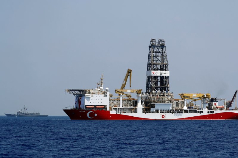 The drilling vessel Yavuz is escorted by the Turkish Navy frigate TCG Gemlik (F-492) in the Eastern Mediterranean off Cyprus, Aug. 6, 2019. (Reuters Photo)
