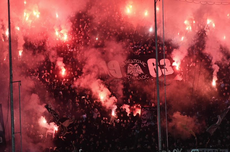 PAOK fans burn flares during the Greek Super League match between PAOK Thessaloniki and Olympiakos Piraeus at the Toumba Stadium in Thessaloniki, Greece, Feb. 23, 2020. (AFP Photo)