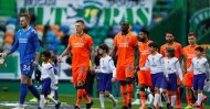 Istanbul Başakşehir enters the pitch prior to the Europa League round of 32 first-leg football match against Sporting CP at the Alvalade stadium in Lisbon, Thursday, Feb. 20, 2020. (Reuters Photo)