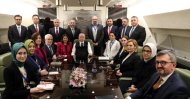 President Recep Tayyip Erdoğan on presidential plane from Baku with journalists including Daily Sabah Ankara Representative Nur Özkan Erbay, Feb.25, 2020 (DHA Photo)