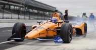 IndyCar driver Fernando Alonso, of Spain, drives out of the pit area during testing at the Indianapolis Motor Speedway in Indianapolis. Alonso will once again attempt to complete motorsports' version of the Triple Crown with a return to the Indianapolis 500 in May with McLaren. (AP Photo/Michael Conroy, File)