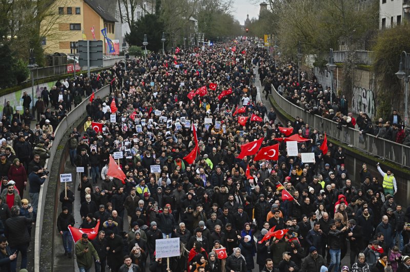 Thousands of people take part in a funeral march against the recent far-right terrorist attack in Hanau, Germany, Feb. 23, 2020. (AP Photo)