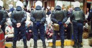 Students stage a protest against the headscarf ban in front of a jewelry shop, across from the Kadıköy İmam Hatip High School, Istanbul, Feb. 21, 2002.