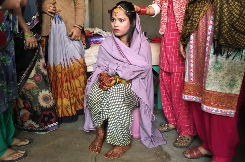 Savitri Prasad, a 23-year-old bride, sits in her parents' home before taking her wedding vows in a riot-affected area following clashes between people demonstrating for and against a new citizenship law in New Delhi, India, Feb. 26, 2020. (Reuters Photo)