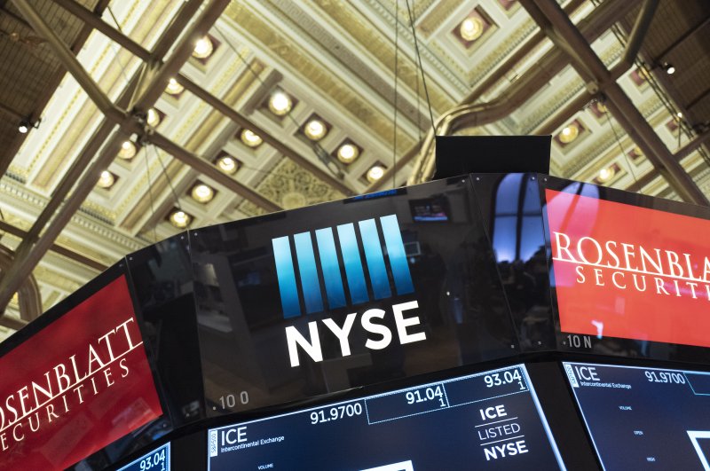 Electronic screens are displayed at the New York Stock Exchange, Wednesday, Feb. 26, 2020. (AP Photo)