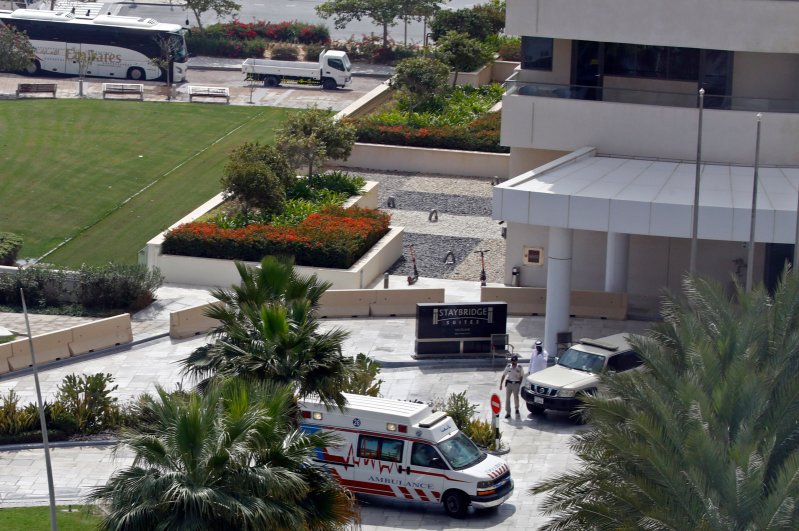 This picture taken on Feb. 28, 2020, shows an ambulance and an emergency medical response team on the scene at the Crowne Plaza hotel at Yas Island Abu Dhabi. (AFP Photo)