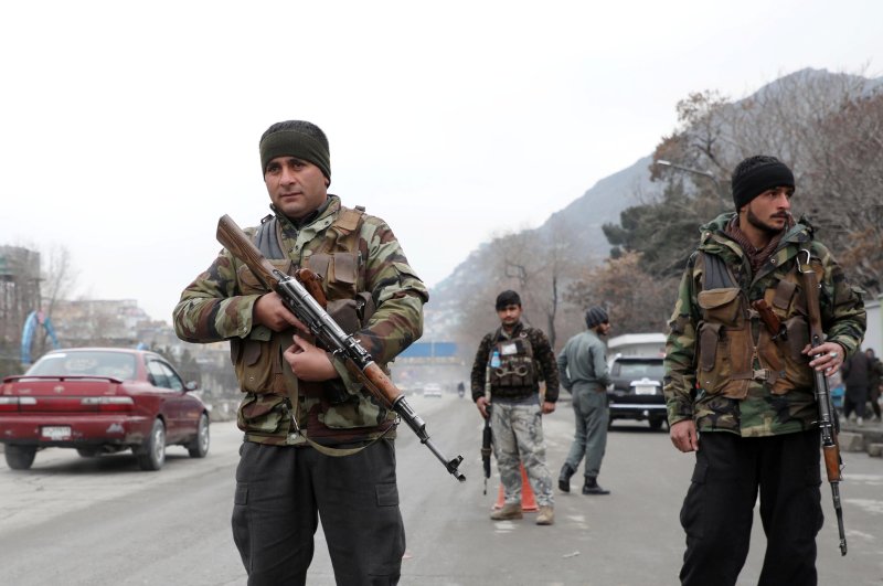 Afghan policemen keep watch at a checkpoint, Kabul, Feb. 28, 2020. (Reuters Photo)