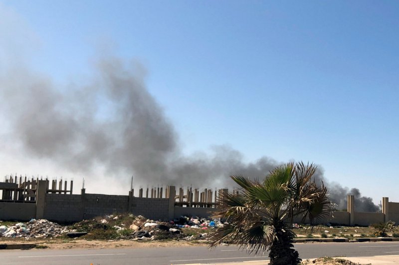 Smoke rises from Mitiga airport after an attack, in Tripoli, Libya, Feb. 28, 2020. (Reuters Photo)