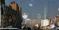 An Iranian woman wearing a protective mask to prevent contracting coronavirus stands in a bus in Tehran, Iran February 29, 2020. (Reuters via WANA)