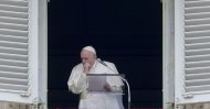 Pope Francis coughs during the Angelus noon prayer from the window of his studio overlooking St. Peter's Square, at the Vatican, March 1, 2020. (AP Photo)