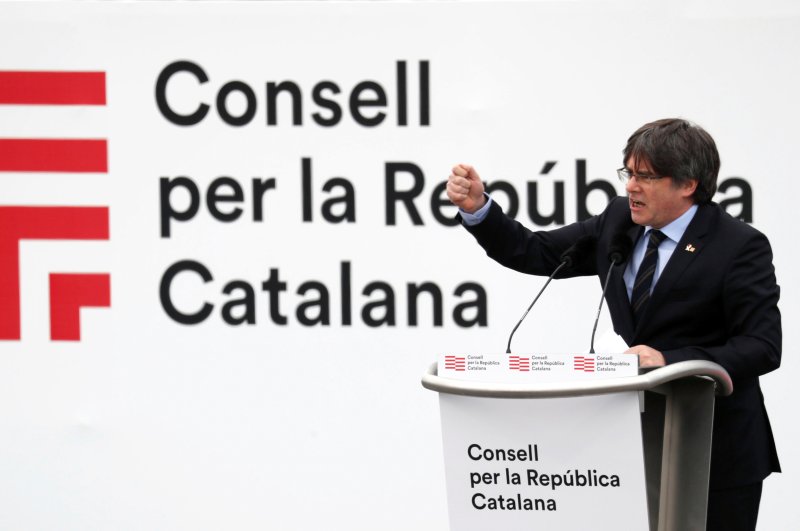 Catalan separatist leader Carles Puigdemont speaks during a rally in Perpignan, France, Feb. 29, 2020. (REUTERS Photo)