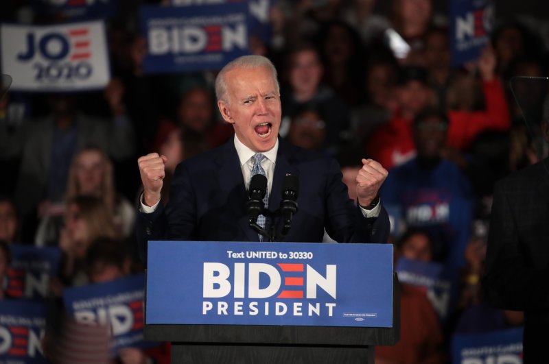 Democratic presidential candidate former Vice President Joe Biden celebrates with his supporters after declaring victory at an election-night rally at the University of South Carolina Volleyball Center, Colombia, South Carolina, Feb. 29, 2020. (AFP Photo)