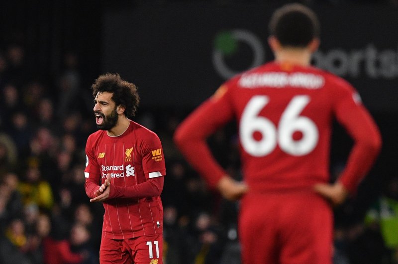 Liverpool's Salah reacts after Watford's Sarr scores his team's second goal during a Premier League match, Feb. 29, 2020. (AFP Photo)