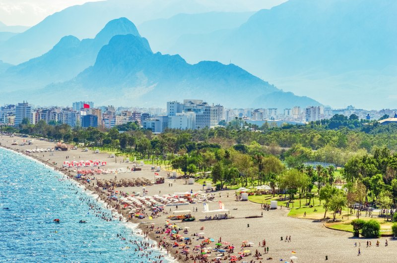 People are seen on a beach in the Mediterranean resort city of Antalya, Aug. 18, 2019. (İhsan Yıldızlı / iStock Photo)