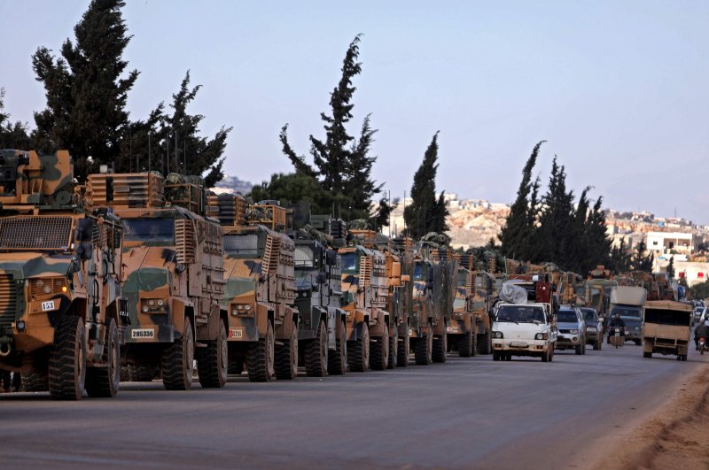 A Turkish military convoy is seen parked near the town of Batabu on the highway linking Idlib to the Syrian Bab al-Hawa border crossing with Turkey, March 2, 2020. (AFP)