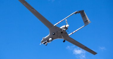 In this file photo taken on December 16, 2019, the Bayraktar TB2 drone flies at in the skies of Turkish Republic of Northern Cyprus (TRNC). (AFP Photo)