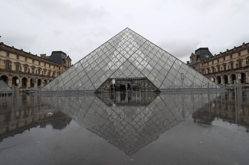 A view of the deserted courtyard outside the closed Pyramid, the main entrance to the Louvre museum which was once a royal residence, located in central Paris, March 2, 2020. (AFP Photo)