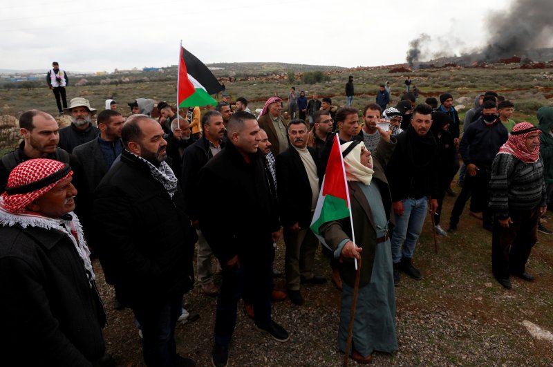 Palestinian demonstrators gather during a protest against Israeli settlements in the village of Qusra, in the Israeli-occupied West Bank, March 2, 2020. (REUTERS Photo)