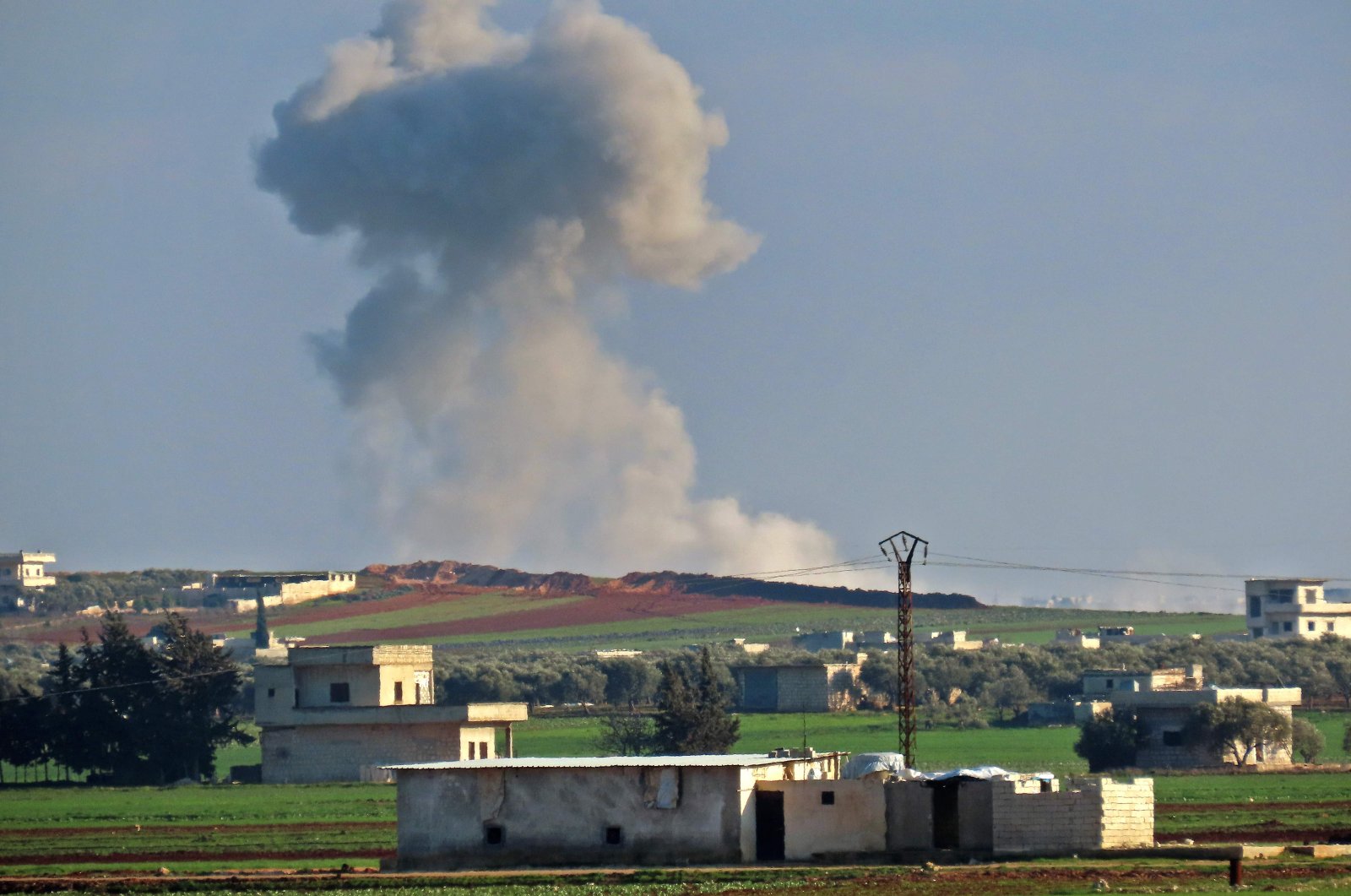 Smoke seen billowing following an airstrike by pro-regime forces near the town of Saraqib in the eastern part of the Idlib province in northwestern Syria, March 2, 2020. (AFP Photo)