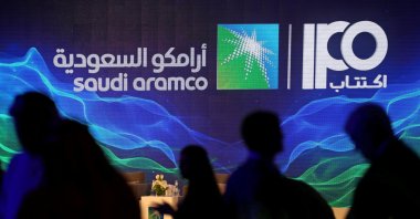 The logo of Saudi Aramco's initial public offering (IPO) is seen during a news conference by the state oil company at the Plaza Conference Center in Dhahran, Saudi Arabia Nov. 3, 2019. (Reuters Photo)