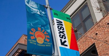 SXSW 2020 banners are seen in the Red River Cultural District on March 6, 2020 in Austin Texas. (AFP Photo)