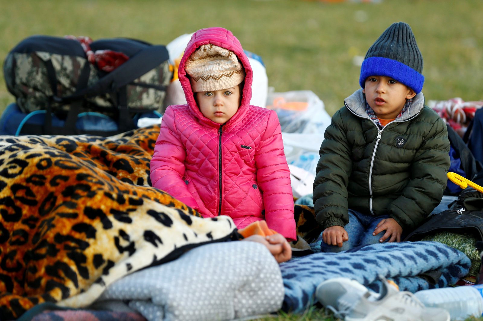 Migrant children are seen near Turkey's Pazarkule border crossing with Greece's Kastanies, near Edirne, Turkey, March 7, 2020. (Reuters Photo)