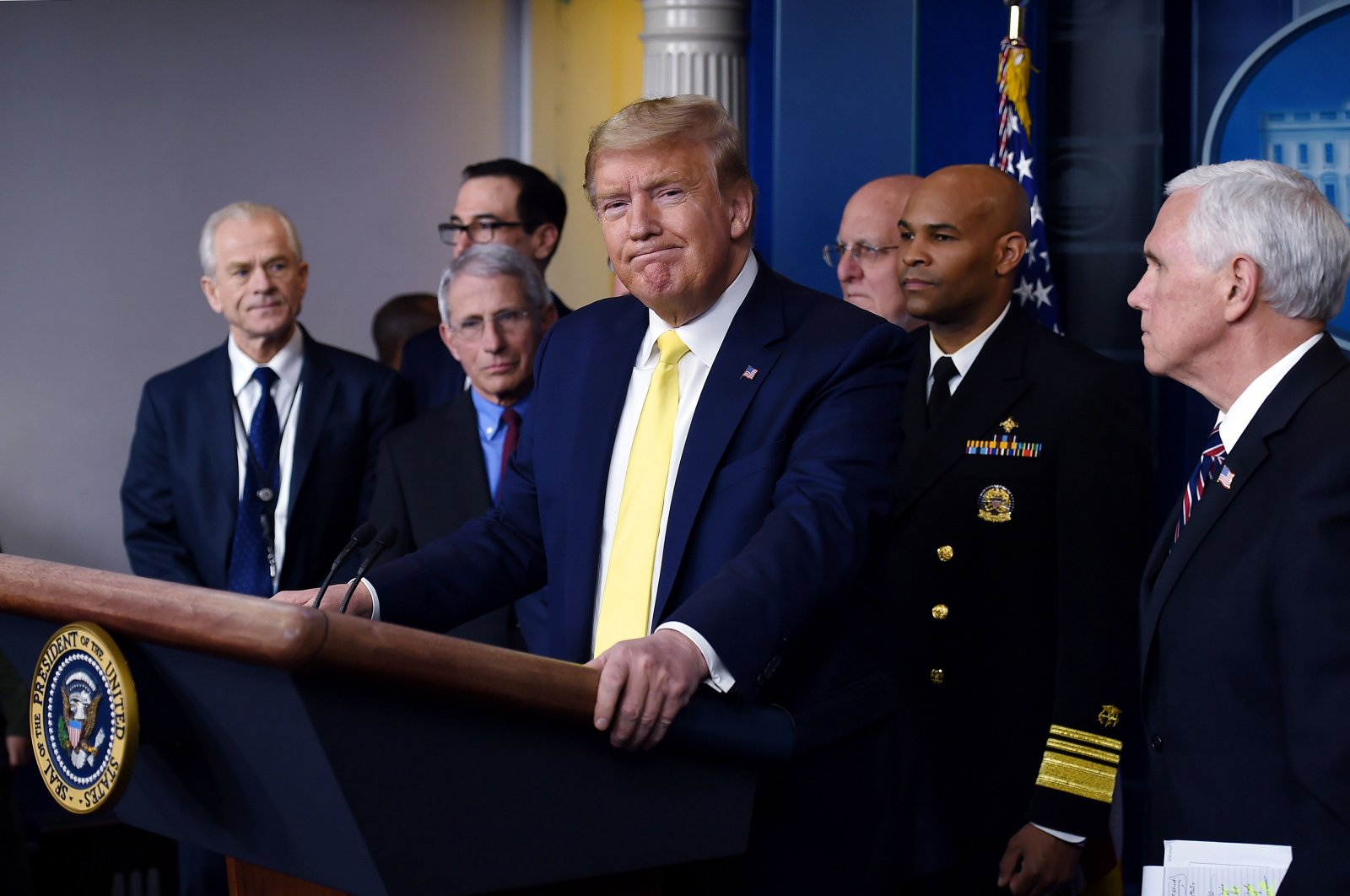 U.S. President Donald Trump speaks about the COVID-19 (coronavirus) alongside Vice President Mike Pence and members of the Coronavirus Task Force at the White House in Washington, D.C., March 9, 2020. (AFP Photo)