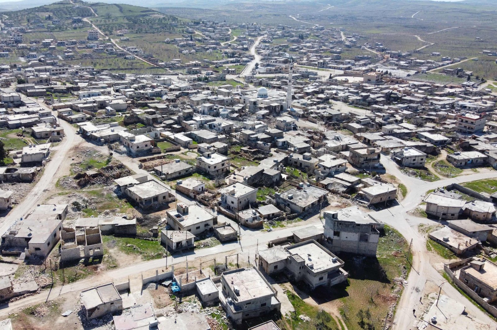 An aerial view shows destruction in the village of Kansafra in al-Zawiya Mountain region of Syria's northwestern province of Idlib on March 8, 2020. (AFP Photo)