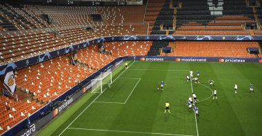 Atalanta's Josip Ilicic scores a penalty kick during the match of Champions League round of 16 second leg soccer match between Valencia and Atalanta in Valencia, Spain, Tuesday March 10, 2020. (UEFA via AP)