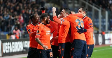 Başakşehir players celebrate advancing to the next round in UEFA Europea League after knocking out Sporting CP, Feb. 27, 2020. (İHA Photo)