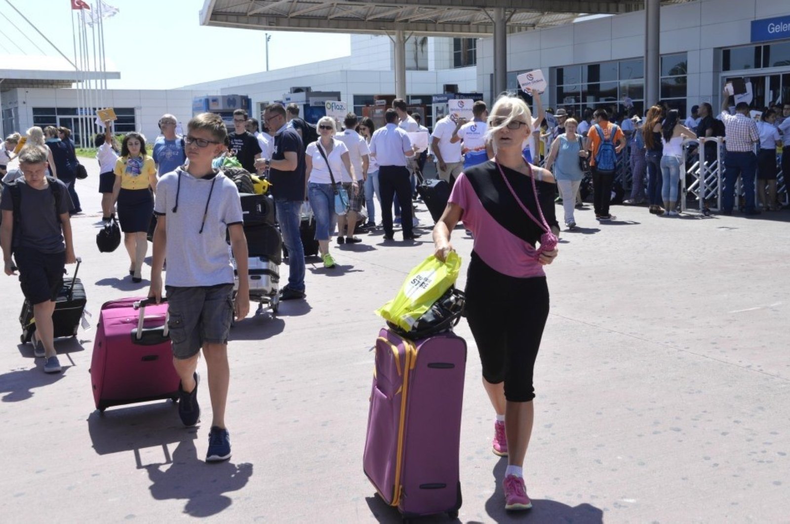 In this undated file photo, tourists are seen arriving in the Mediterranean resort city of Antalya, a favorite spot for Russian tourists. 