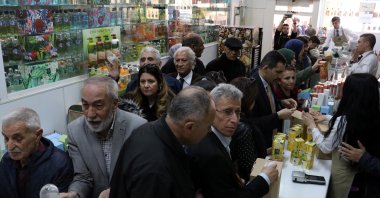 A crowd of customers waits to make purchases at a cologne shop in Ankara, Thursday, Mar. 12, 2020. (DHA Photo)