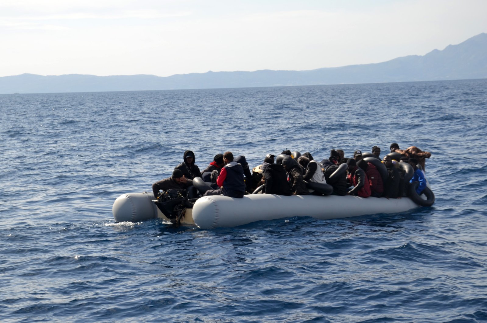 Turkish Coast Guard Command rescues 125 migrants and refugees pushed back into Turkish waters by the Greek coast guard off İzmir province, Thursday, March 12, 2020. (Photo from Coast Guard Command via AA)