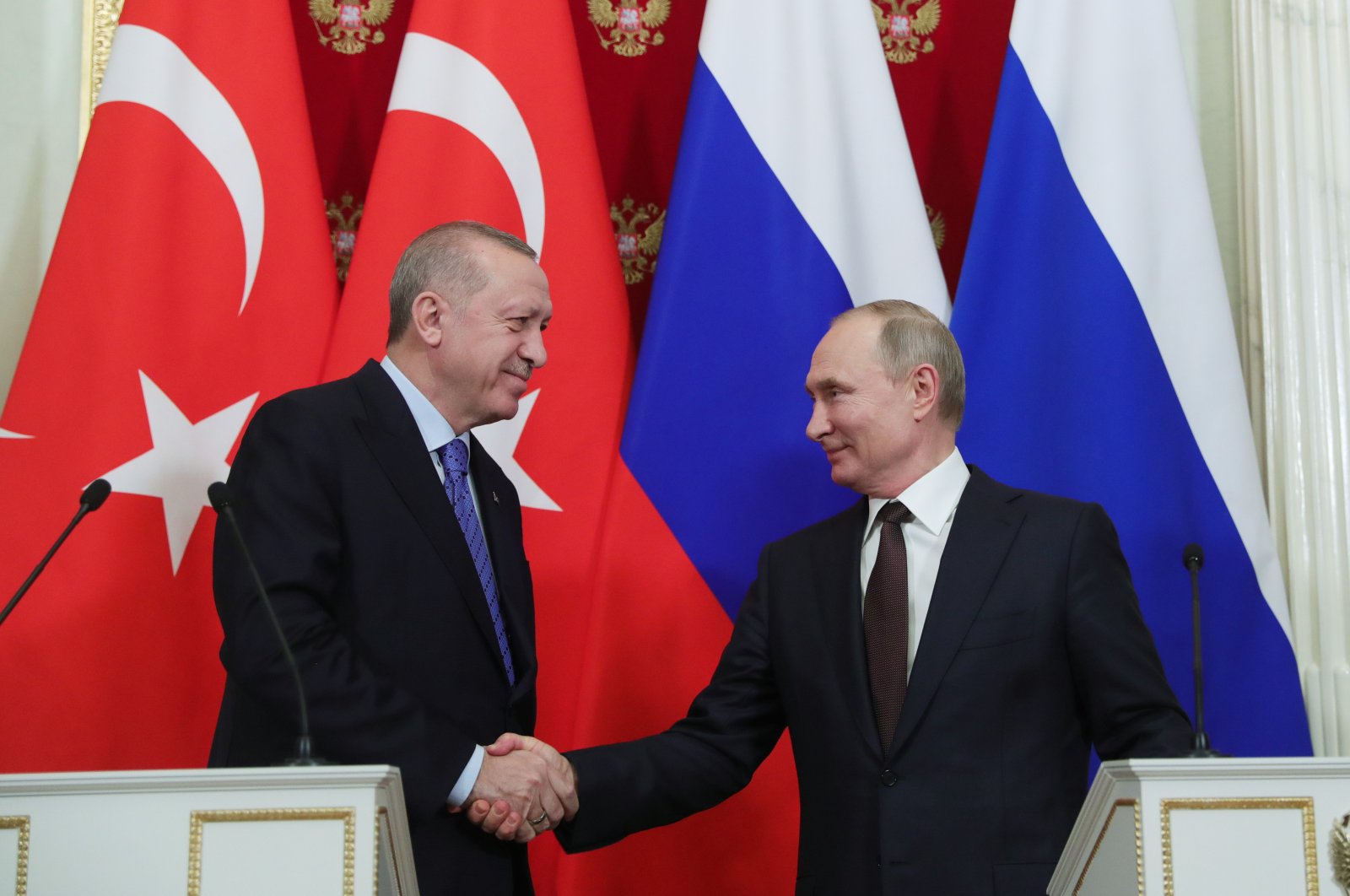 President Recep Tayyip Erdoğan and President Vladimir Putin shake hands following a meeting in Moscow on March 6, 2020 (AA Photo)