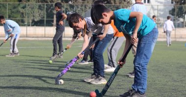 More and more boys take up hockey nowadays in Suruç. (AA Photo) 