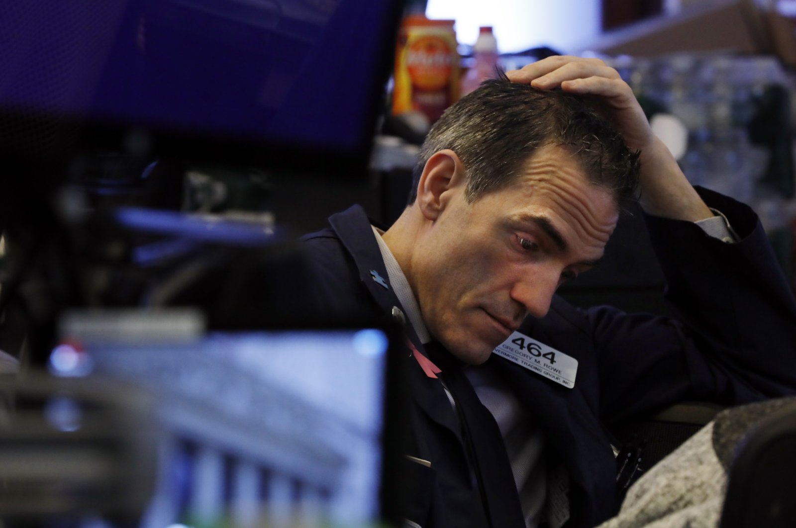 Trader Gregory Rowe prepares for the day's activity on the floor of the New York Stock Exchange, Monday, March 9, 2020. (AP Photo)