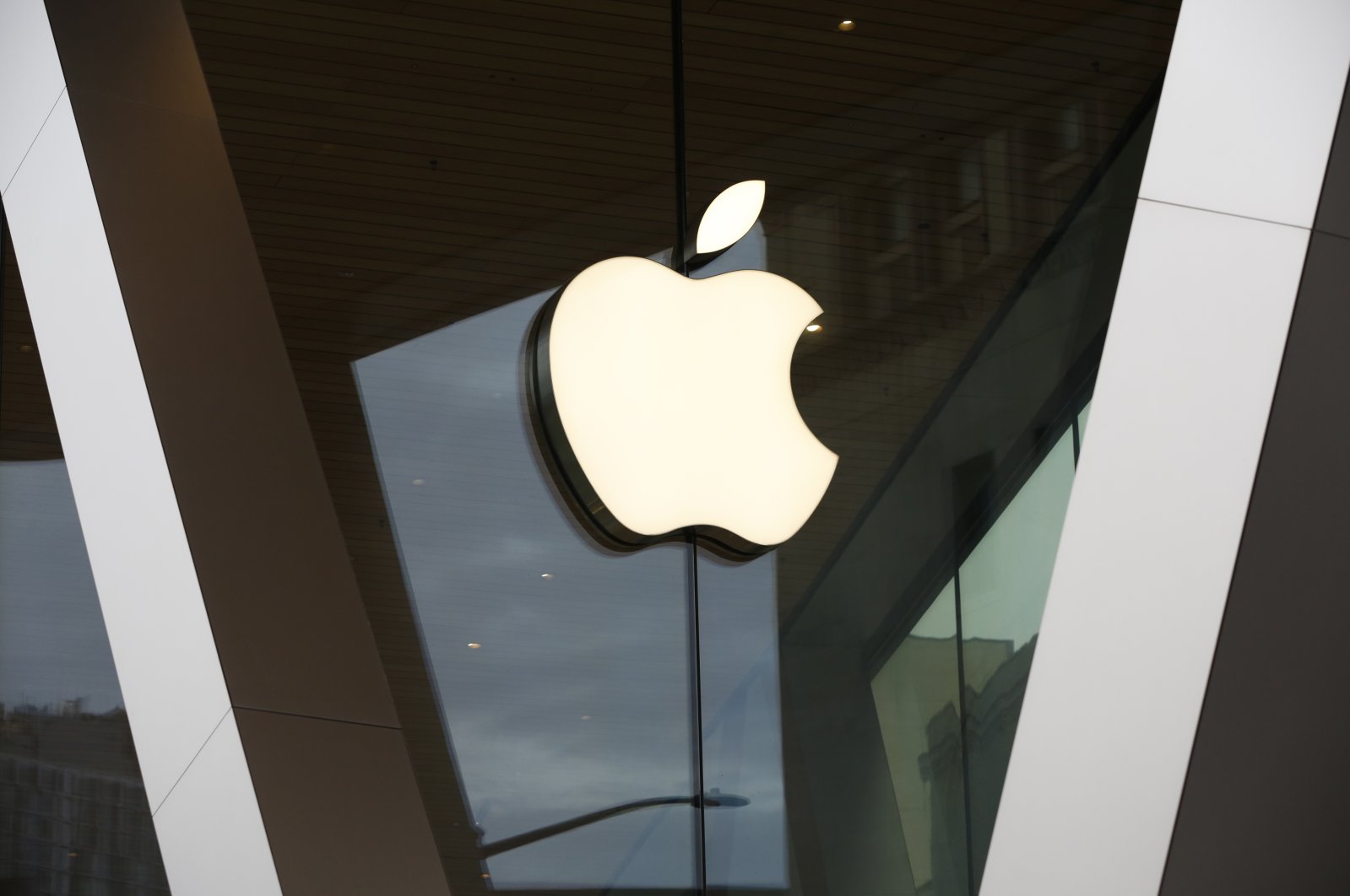An Apple logo adorns the facade of the downtown Brooklyn Apple store in New York on Saturday, March 14, 2020. (AP Photo)