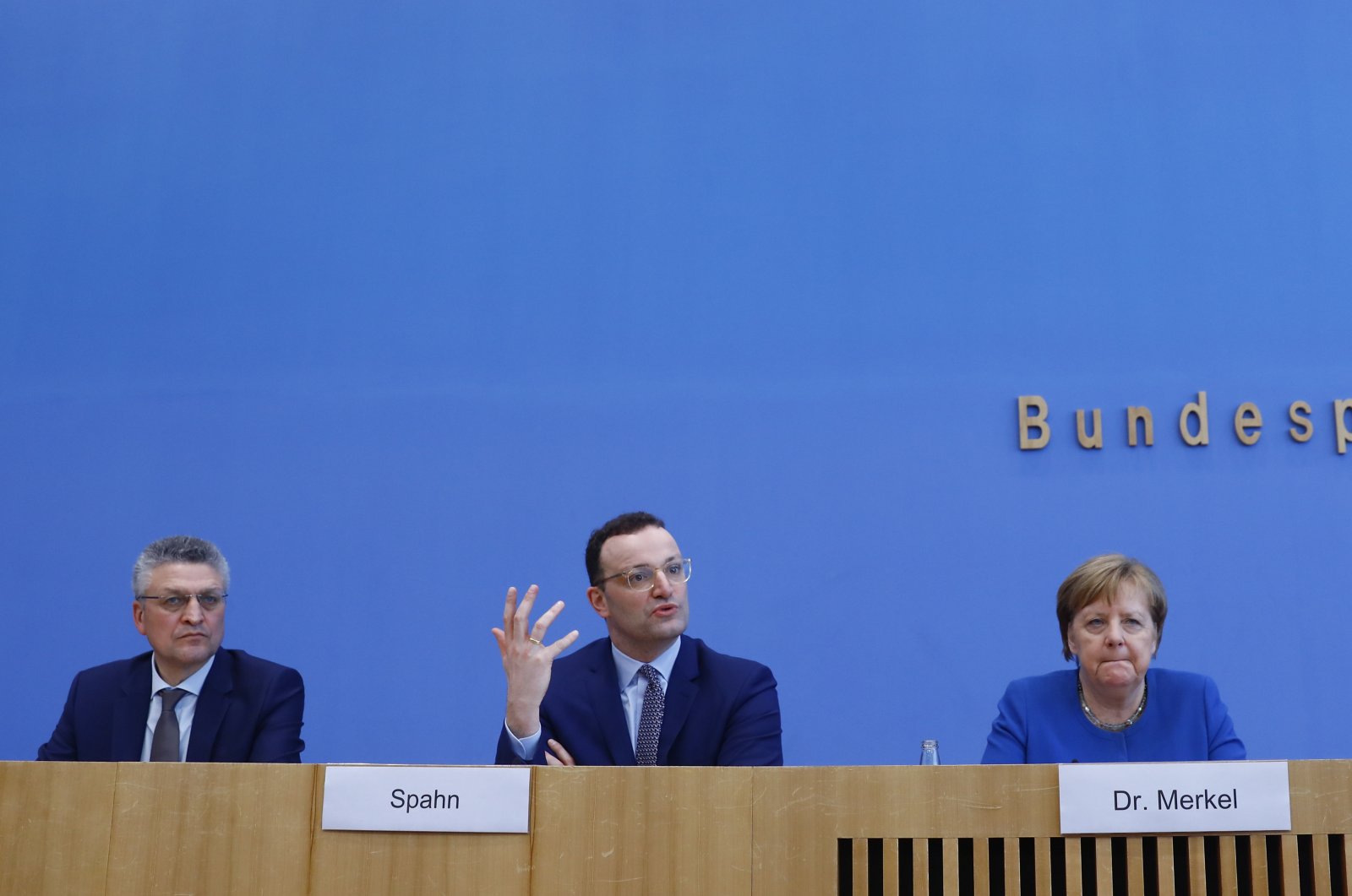 German Chancellor Angela Merkel (R) and Health Minister Jens Spahn (M) and Robert Koch Institute chief Lothar Wieler (L) at a news conference on coronavirus in Berlin, Germany, March 11, 2020. (AA Photo)