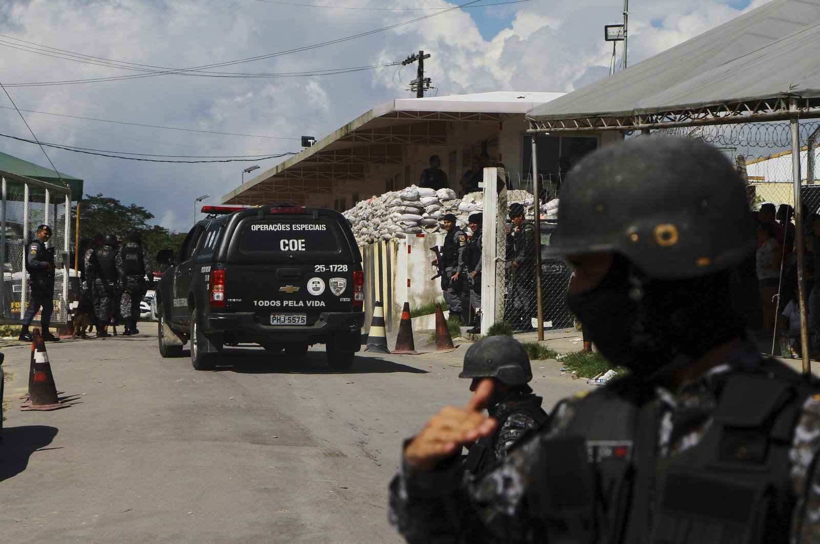 Police guard the entrance to the Anisio Jobim Prison Complex in Manaus in the northern state of Amazonas, Brazil, Sunday, May 26, 2019. (AP Photo)