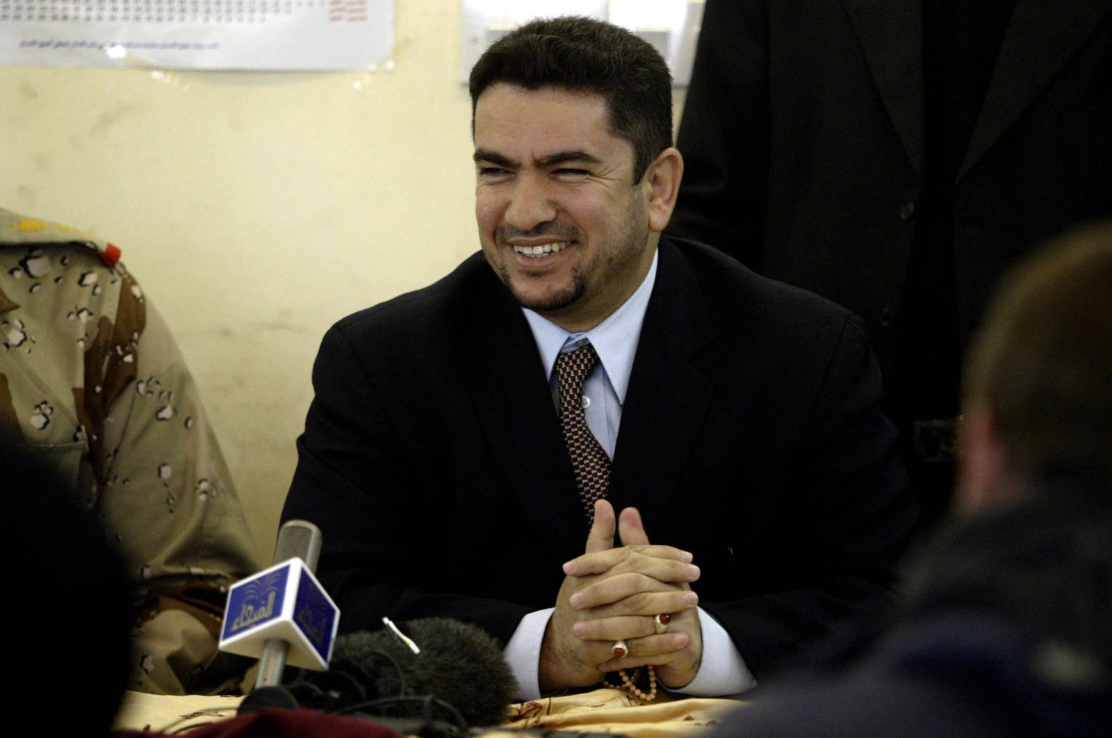 Iraq's new prime minister-designate, Adnan al-Zurfi, speaks to the press at the Human Rights Center, Baghdad, Jan. 25, 2005. (AFP Photo)