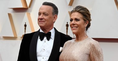 This file photo taken on February 9, 2020 shows US actor Tom Hanks and wife Rita Wilson (R) arriving for the 92nd Oscars at the Dolby Theatre in Hollywood, California. (AFP Photo)