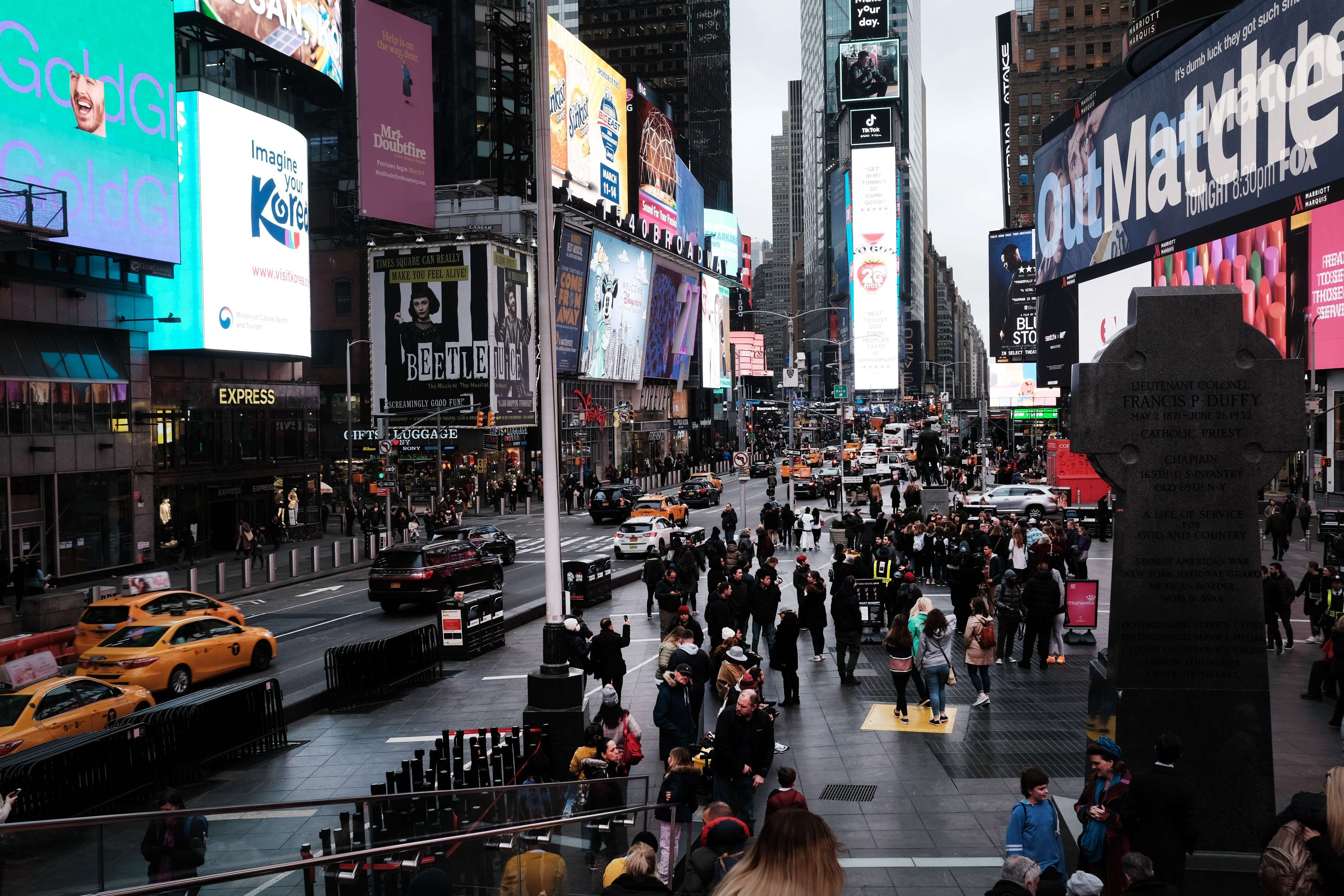 NEW YORK, NEW YORK - MARCH 12: People walk in Times Square in Manhattan on March 12, 2020 in New York City. New York Citys Broadway theaters will need to close by 5 p.m. Thursday after New York Governor Andrew Cuomo has announced a ban on gatherings of 500 people or more amid the growing coronavirus outbreak. Spencer Platt/Getty Images/AFP
== FOR NEWSPAPERS, INTERNET, TELCOS & TELEVISION USE ONLY ==