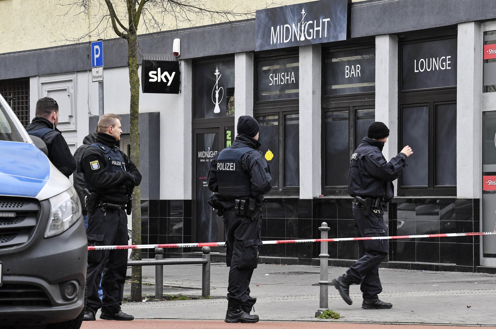 Police secure the hookah bar, Hanau, Feb. 20, 2020. (AP Photo)