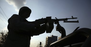 Afghan security personnel stand guard after an attack in Kabul, Afghanistan, Friday, March 6, 2020. (AP Photo)