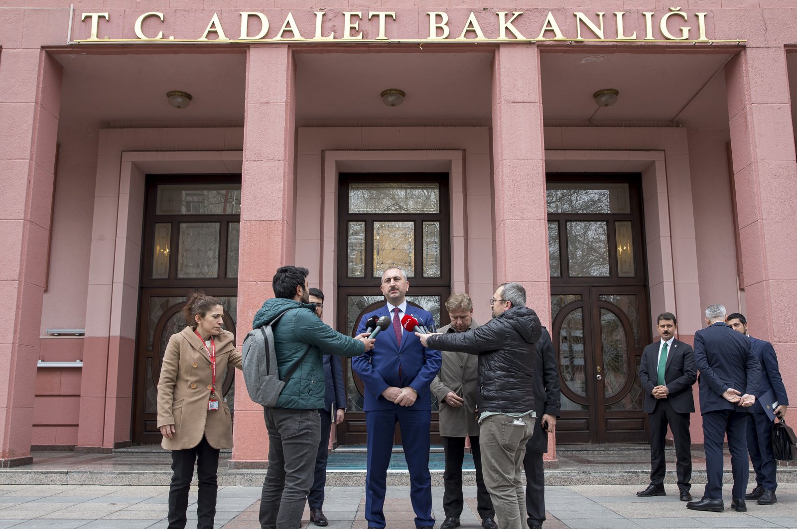 Justice Minister Abdulhamit Gül answers journalists' question in front of the ministry, March 20, 2020 (AA Photo)